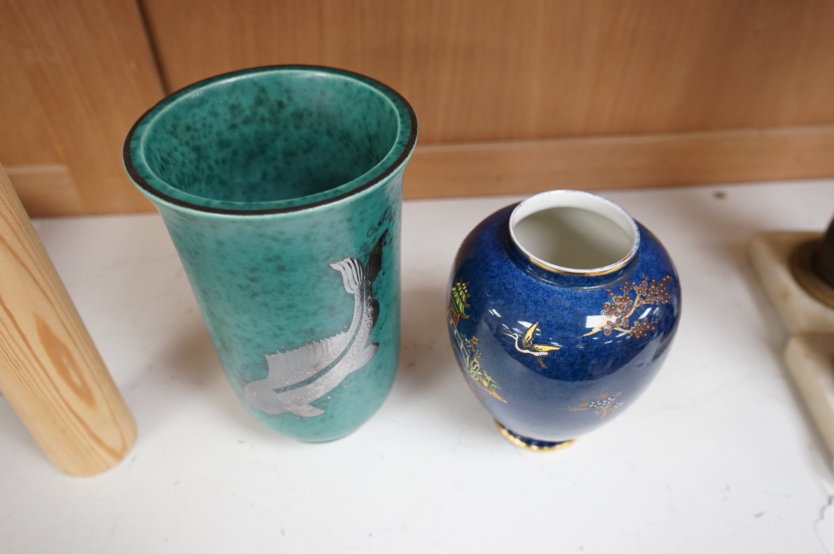 A Gustavsberg Argenta ware vase and a Carlton ware vase, tallest 16.5cm high.